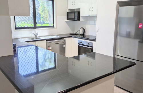 Kearneys Spring Casa | Home with Golf Course Frontage !