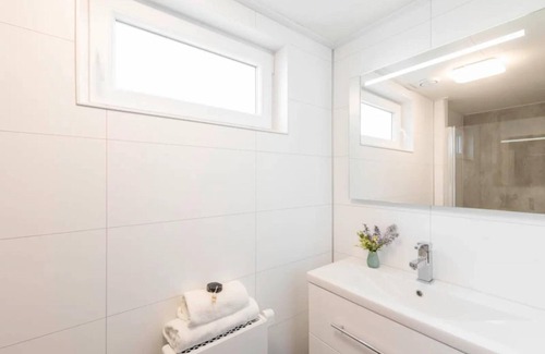 Wemeldinge Casa | Home with modern interior with air conditioning and view of the forest.