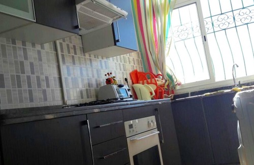 Tetouan Apartamento | Homerez - Apartamento a 1 km de la playa para 7 pers. con jardín en Tetouan