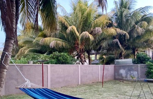 Flic-en-Flac Casa | Homerez - Casa a 500 m de la playa para 6 pers. con jardín en Flic en Flac