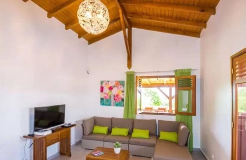 Anse-Bertrand Casa | Homerez - Casa para 2 pers. con piscina compartida y jacuzzi en Anse-Bertrand