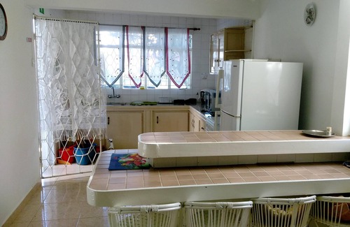 Pointe aux Biches Casa | Homerez - Nice house for 7 ppl. with shared pool and garden at Trou-aux-Biches