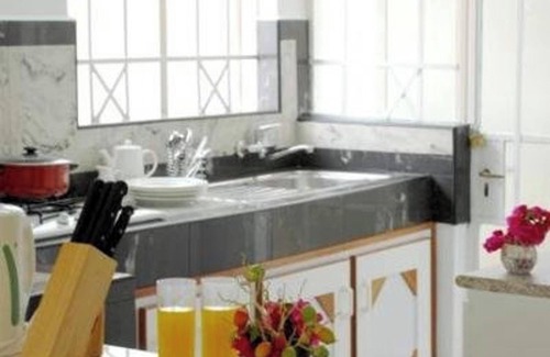 Flic-en-Flac Casa | Homerez - Casa espaciosa en Flic en Flac con piscina compartida