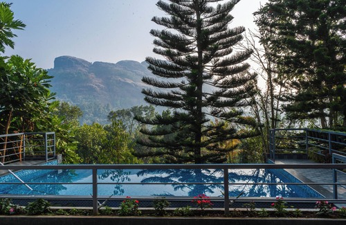Devikolam Casa | Homestay with Serine Views, Pool, and delicious local food.