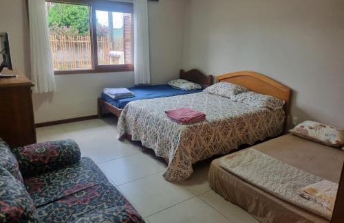 Centro Casa | Hospedagem Sil e Jean quarto família, cozinha compartilhada com outros hóspedes