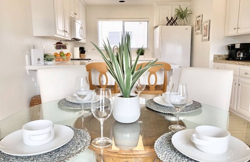 Downtown Condominio | Host By Owner! Family Size Condo! Walk to the Beach & Downtown! Two-car garage!