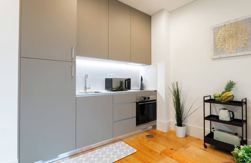 Guimaraes Apartamento | HostWise - Bright and Cozy Flat w/ Balcony
