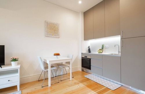 Guimaraes Apartamento | HostWise - Bright Flat w/ Balcony