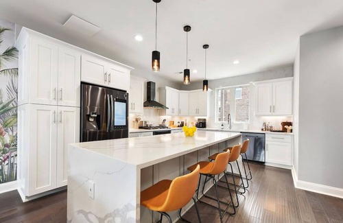 Lower Lawrenceville Casa | ★ HostWise Stays ★ Rooftop patio, King Bed, Garage Parking, Prime Location!
