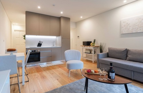 Guimaraes Apartamento | HostWise - Sunny Flat w/ Balcony