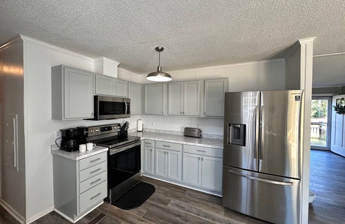 Newport Casa | Hot Tub, Pet Friendly, 3 miles to Emerald Isle, fully fenced yard.