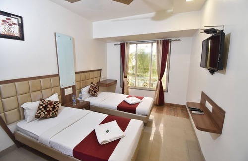 Kamothe Hotel | Hotel Candor Amigo