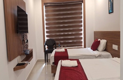 Kannur Hotel | Hotel Faaz International