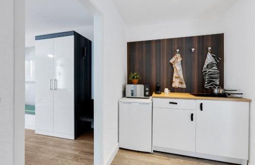 Neu-Isenburg Apartamento | Hotel Montago- Dein großes Zimmer mit hervorragender Infrastruktur