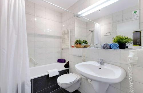 Neu-Isenburg Apartamento | Hotel Montago- Dein großes Zimmer mit hervorragender Infrastruktur