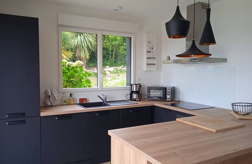 Berven Casa | House ball with a view of the sea, surrounded by greenery, out of sight