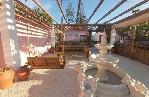 Magoito Casa | House, beautiful garden & playground near the beach