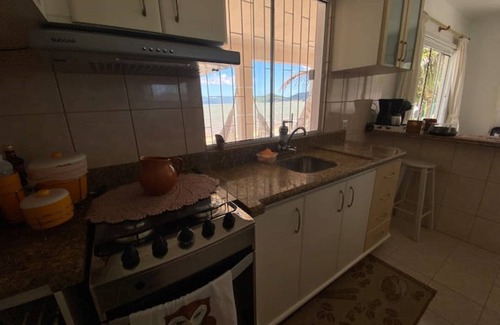 Palhoca Casa | House Facing the Sea