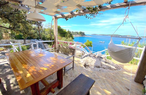 Hvar Casa | house for two with a private terrace located directly on the beach, town Hvar