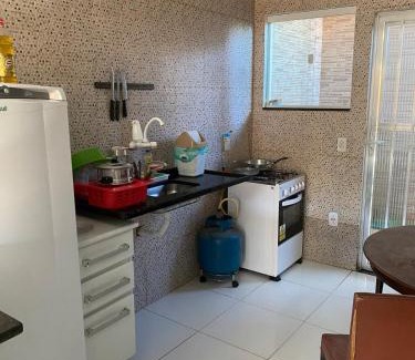 Porto da Roca Apartamento | House in Itaúna, 4-minute walk to the beach