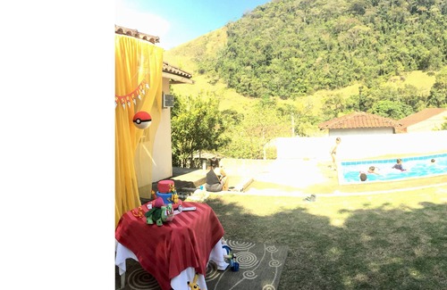 Corrego do Ouro Cabaña | House in the mountains with pool and river.