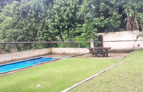Corrego do Ouro Cabaña | House in the mountains with pool and river.