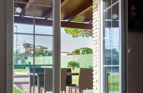 El Puerto de Santa Maria Villa | Casa con pista de tenis y piscina junto a la playa