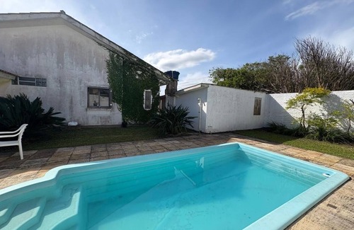 Santa Teresinha Casa | House with a unique style, cozy and just a few meters from the beach.