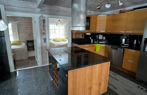 Lohja Casa | Casa con sauna, barbacoa, bañera de hidromasaje y gran terraza junto al lago.