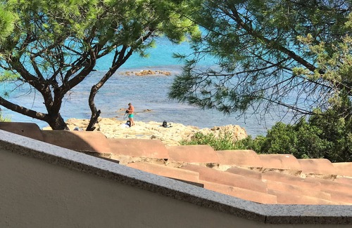 Cala Liberotto Apartamento | Casa con acceso directo a la playa.