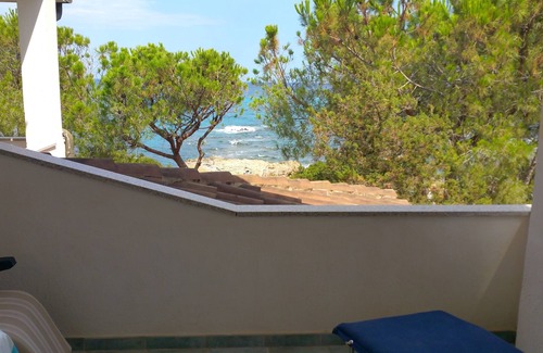 Cala Liberotto Apartamento | Casa con acceso directo a la playa.