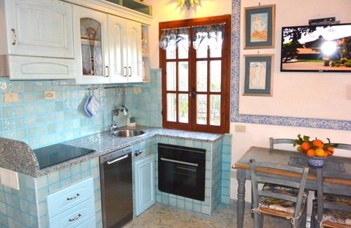 Costa Rei Casa | Casa de vacaciones con jardín cerca de la hermosa playa. Clima y WI-Fi inclu