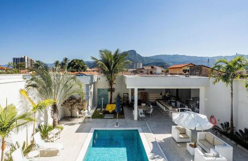 Indaia Casa | Casa com área gourmet e piscina na praia do Indaiá