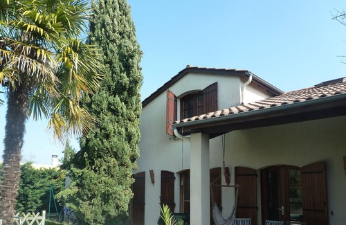 Boe Casa | Casa con jardín en planta baja.