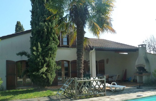Boe Casa | Casa con jardín en planta baja.