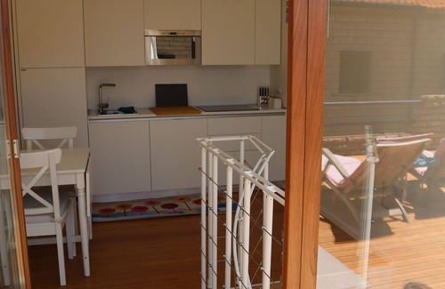 Porto Alabe Casa | Casa con gran terraza con vistas al mar.