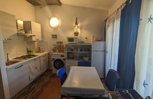 Costa Serena Apartamento | Casa con terraza panorámica, pueblo en la playa con piscina - Porto Pollo