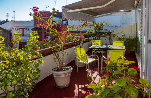 Feria Casa | Casa con terraza en el centro de Sevilla con wifi ,aire acondicionado y garaje