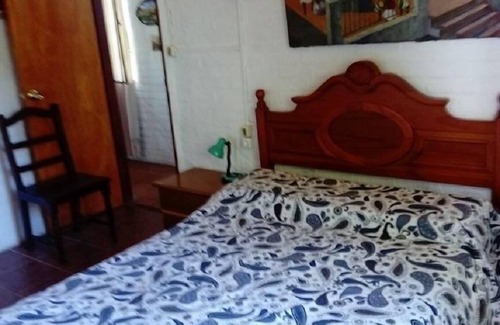 Piriapolis Casa | casa de dos dormitorios para 5/6 personas ubicada en el cerro del toro, cochera