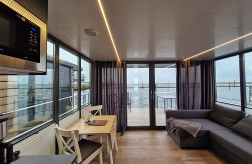 Wendtorf Alquiler De Eote | Houseboat Fjord del Sol with bio sauna and roof terrace in Wendtorf / Kiel Fjord