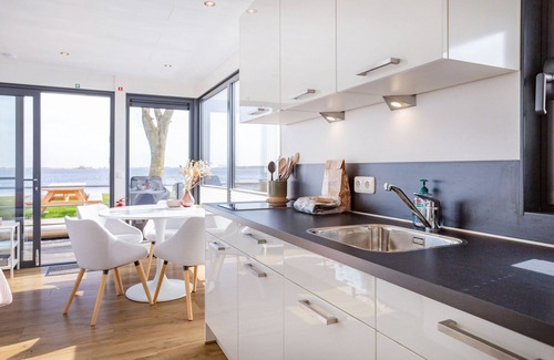 Offingawier Alquiler De Eote | Casa flotante Sneekermeer con jardín y vistas