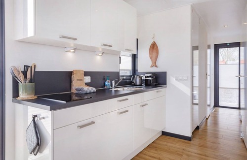 Offingawier Alquiler De Eote | Casa flotante Sneekermeer con jardín y vistas