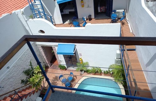 Cartagena Walled City Apartamento | HPT-SC1 HABITACION DE HOTEL CUADRUPLE CON PISCINA AIRE ACONDICIONADO Y WIFi EN GETSEMANI