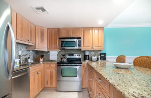 Seven Mile Beach Condominio | Enorme Porche! 3Bedroom-Oceanfront Condo