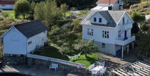 Flekkefjord Casa | Hytte ved sjøen på Andabeløy - Båt kan leies
