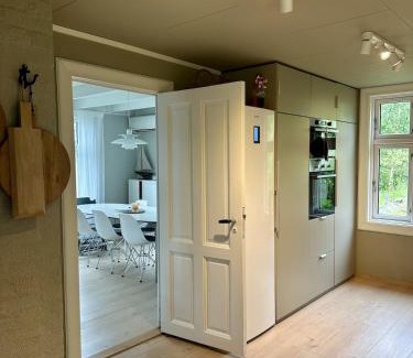 Flekkefjord Casa | Hytte ved sjøen på Andabeløy - Båt kan leies