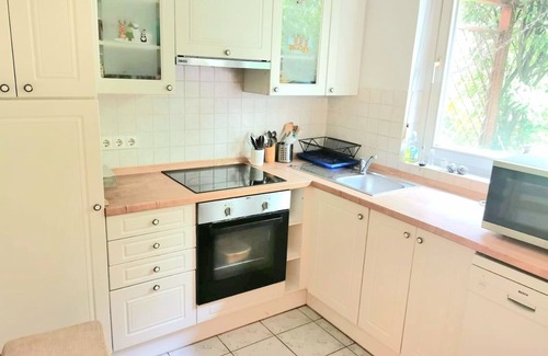 Budavar Apartamento | Idyllic Apartment w/ a Private Patio and Huge Communal Garden! (Pet-Friendly)
