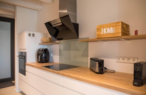 Rysum Apartamento | Idyllic vacation home Van Senden 8 Elsje for families and couples