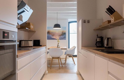 Rysum Apartamento | Idyllic vacation home Van Senden 8 Elsje for families and couples