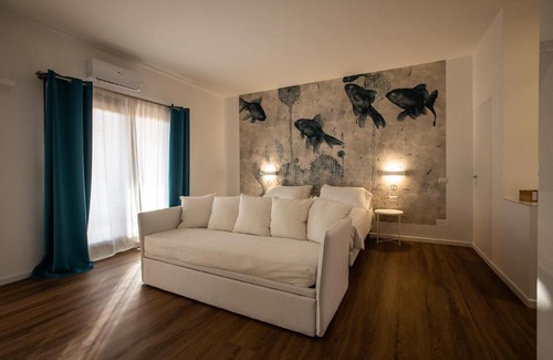 Porto San Paolo Casa | Il Borgo Boutique Rooms by KasaVacanze